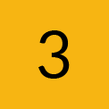 En gul block med nummer tre